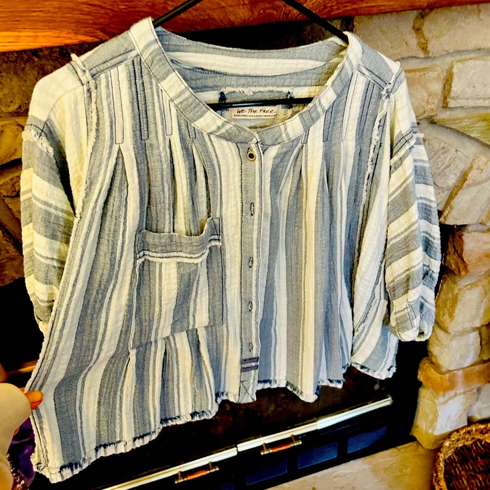 Free people blouse. Super cute. Worn a couple times. Boxy fit.xs